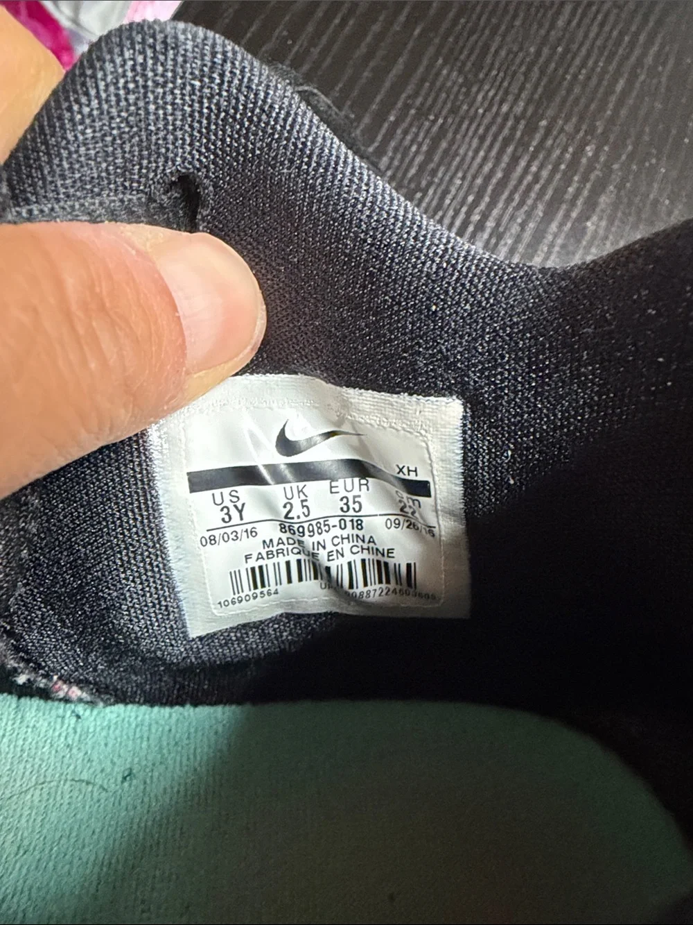 Nike Kids Black Sneakers with silver Swoosh